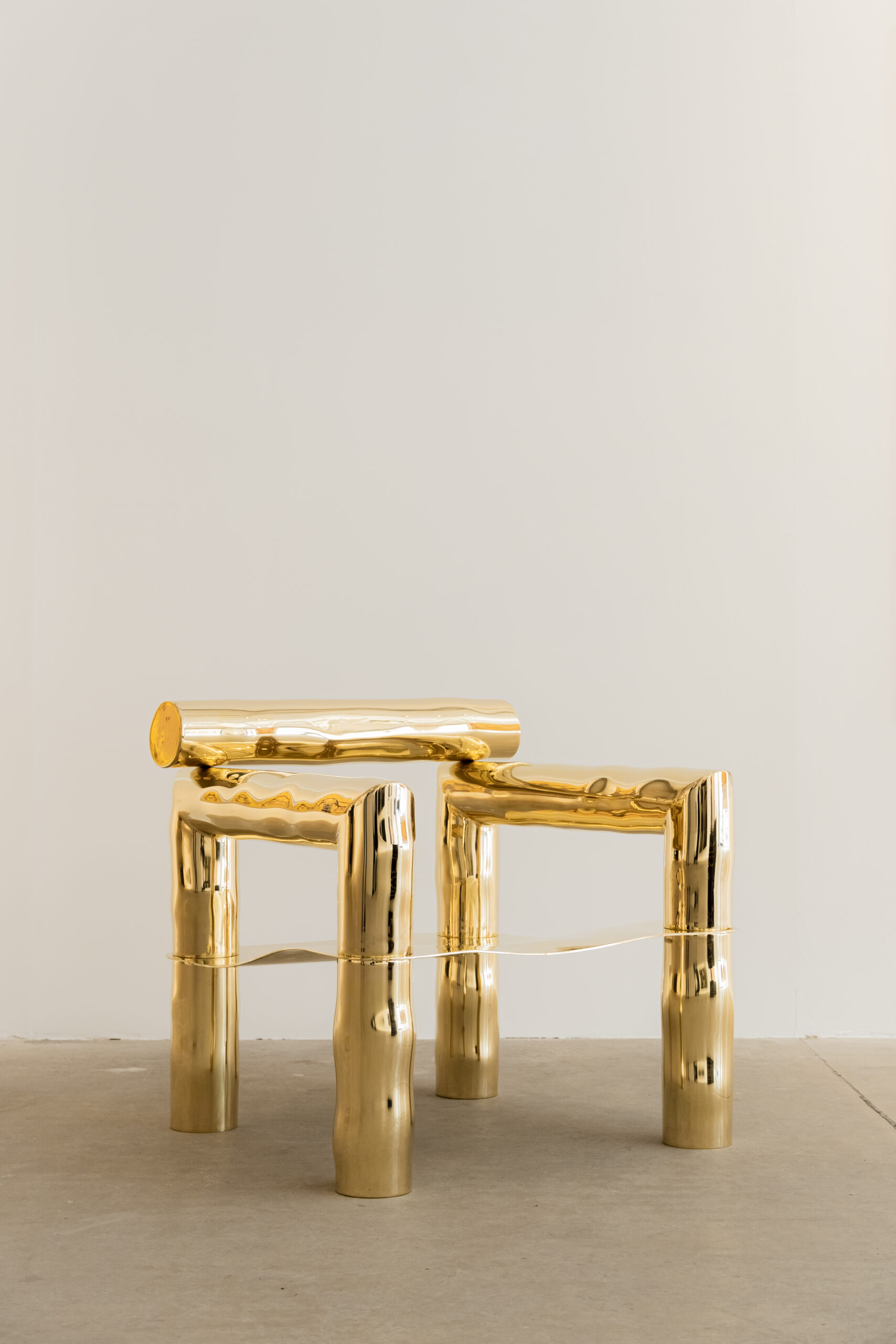 BOBI – brass armchair by Victor Tison